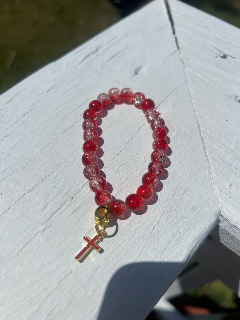Red Sparkled Glass Beads Stretch Bracelet with Res Gold Cross Charm